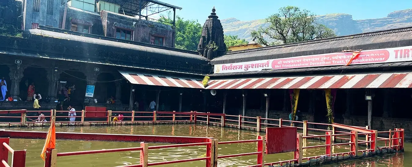 Kushavarta Kund at Trimbakeshwar with the Brahmagiri hills behind